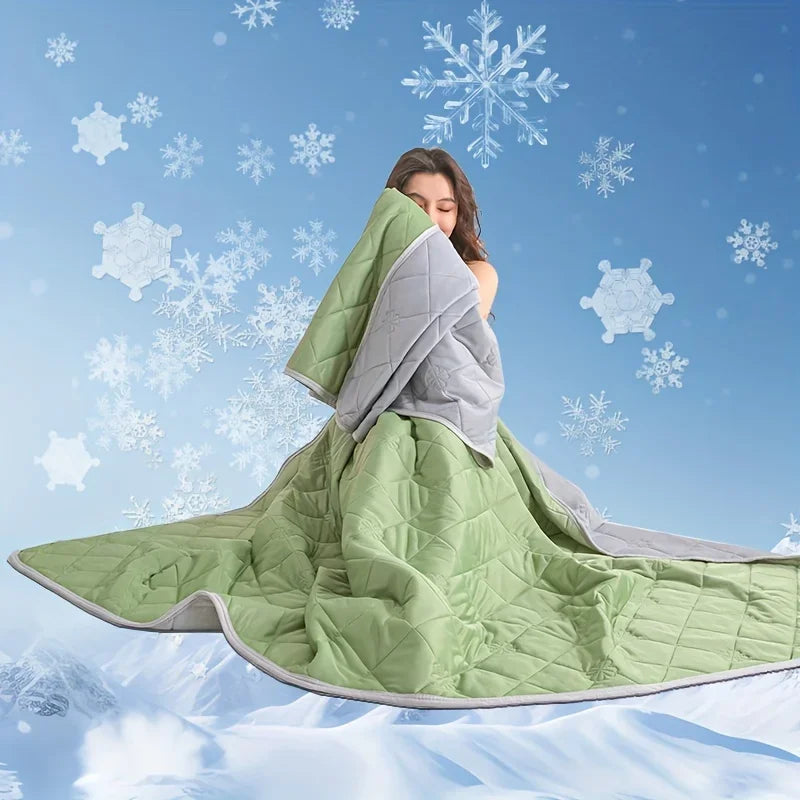 Soft lightweight cooling blanket in green for camp and home