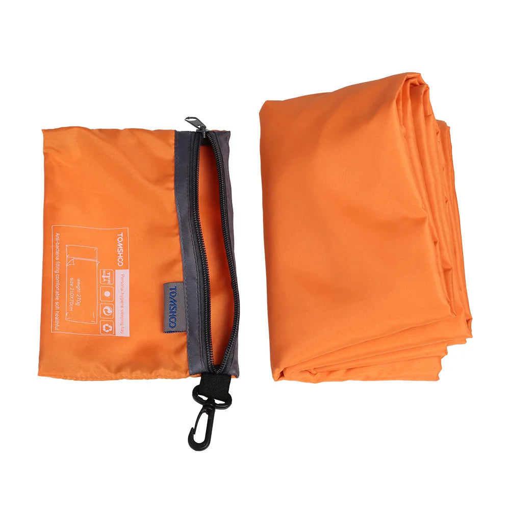 Compact foldable sleeping bag liner for camping and travel use