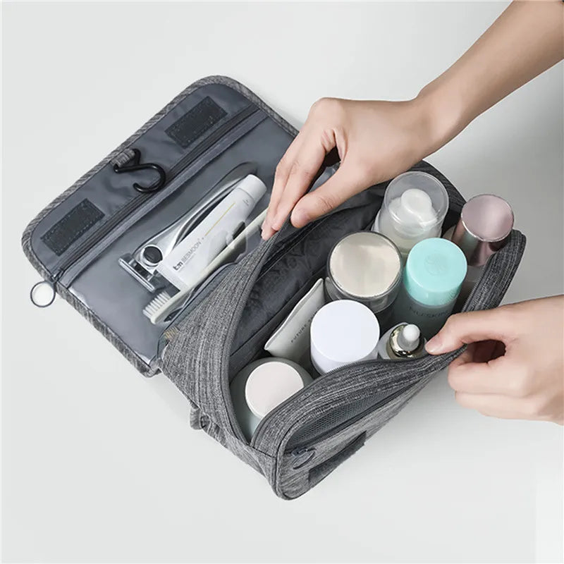 Travel toiletry organizer with spacious compartments for makeup and toiletries