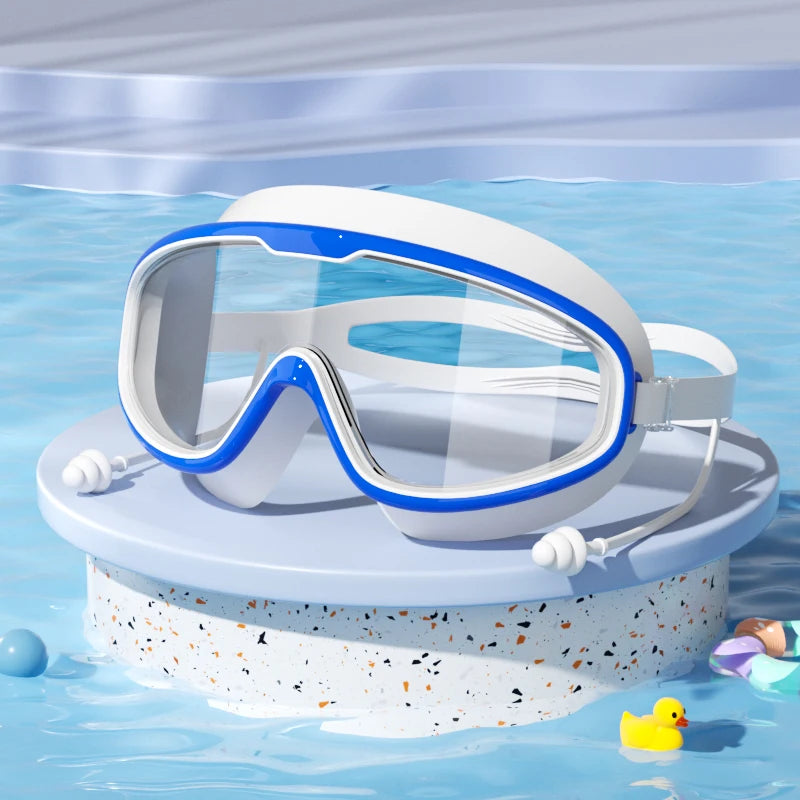 Kids swim goggles in [color] with adjustable strap and anti-fog lenses