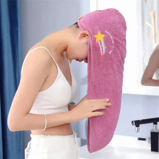 Quick dry microfiber hair towel wrap used after shower to dry hair