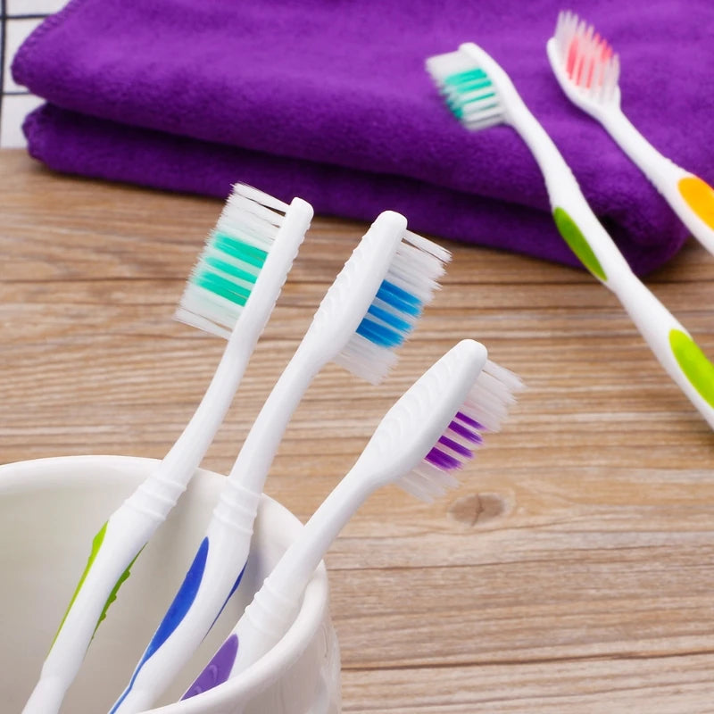 Assorted color toothbrushes included in 10-pack family toothbrush set