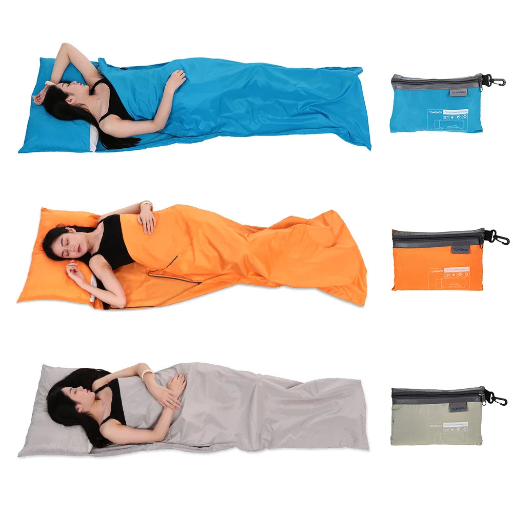 Youth sleeping bag liner in use for camp and travel bedding