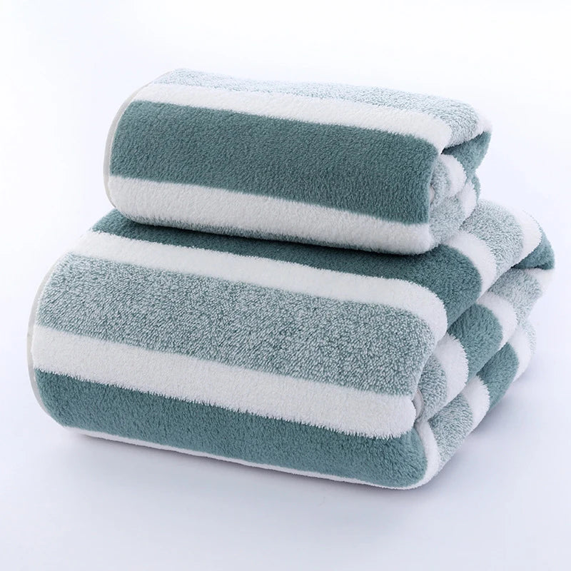 Quick-dry camp and travel towel stacked showing lightweight microfiber fabric